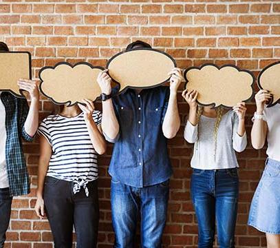 Group of students with chat bubbles over their faces